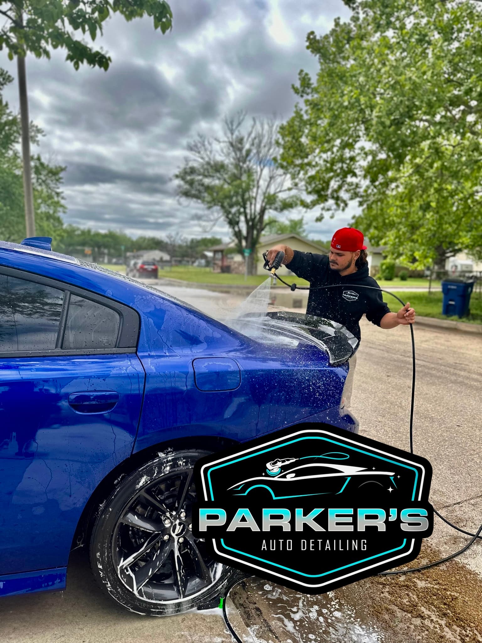 parkers detail owner Tyler Parker performing exterior rinse before paint protectant